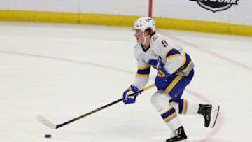 Feb 28, 2021; Buffalo, New York, USA; Buffalo Sabres center Jack Eichel (9) skates up the ice with the puck against the Philadelphia Flyers during the second period at KeyBank Center. Mandatory Credit: Timothy T. Ludwig-USA TODAY Sports