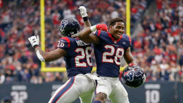 Miller and Blue, running backs for the Houston Texans (Photo by Bob Levey/Getty Images)