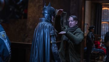 (L-r) ROBERT PATTINSON and director MATT REEVES and on the set in Warner Bros. Pictures’ action adventure “THE BATMAN,” a Warner Bros. Pictures release. Photo: Jonathan Olley/™ & © DC Comics. © 2021 Warner Bros. Entertainment Inc. All Rights Reserved.