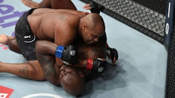NEW YORK, NY - NOVEMBER 03: (L-R) Daniel Cormier elbows Derrick Lewis in their UFC heavyweight championship bout during the UFC 230 event inside Madison Square Garden on November 3, 2018 in New York, New York. (Photo by Jeff Bottari/Zuffa LLC/Zuffa LLC via Getty Images)