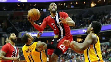 Mar 5, 2016; Washington, DC, USA; Washington Wizards guard John Wall (2) shoots over Indiana Pacers guard Monta Ellis (11) during the second half at Verizon Center. The Indiana Pacers won 100 - 99. Mandatory Credit: Brad Mills-USA TODAY Sports