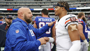 EAST RUTHERFORD, NEW JERSEY - OCTOBER 02: Head coach Brian Daboll of the New York Giants shakes hands with Justin Fields #1 of the Chicago Bears after their game at MetLife Stadium on October 02, 2022 in East Rutherford, New Jersey. (Photo by Sarah Stier/Getty Images)