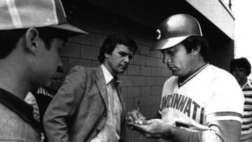 APRIL 7, 1980: Johnny Bench signs an autograph in the Al Lopez Field dugout during spring training this year as NBC Today Show host Tom Brokaw looks on. Bench is a popular figure with the national news media.Enquirer File PhotoBench 5