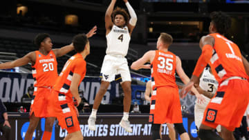 INDIANAPOLIS, INDIANA - MARCH 21: Miles McBride #4 of the West Virginia Mountaineers (Photo by Stacy Revere/Getty Images)