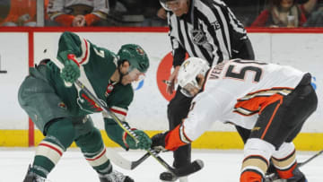 ST. PAUL, MN - FEBRUARY 17: Matt Cullen #7 of the Minnesota Wild takes a faceoff against Antoine Vermette #50 of the Anaheim Ducks during the game at the Xcel Energy Center on February 17, 2018 in St. Paul, Minnesota. (Photo by Bruce Kluckhohn/NHLI via Getty Images)