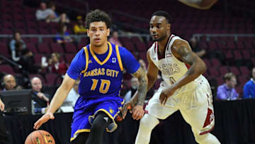 LAS VEGAS, NV - MARCH 10: Broderick Robinson #10 of the UKMC Kangaroos drives against Ian Baker #4 of the New Mexico State Aggies during a semifinal game of the Western Athletic Conference Basketball Tournament at the Orleans Arena on March 10, 2017 in Las Vegas, Nevada. (Photo by Sam Wasson/Getty Images)