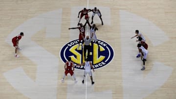NASHVILLE, TN - MARCH 12: The Kentucky Wildcats and Arkansas Razorbacks tip off during the championship game at the 2017 Men's SEC Basketball Tournament at Bridgestone Arena on March 12, 2017 in Nashville, Tennessee. (Photo by Andy Lyons/Getty Images)