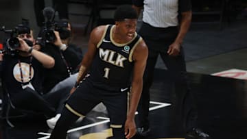 ATLANTA, GEORGIA - JUNE 29: Nathan Knight #1 of the Atlanta Hawks reacts after a dunk against the Milwaukee Bucks during the second half in Game Four of the Eastern Conference Finals at State Farm Arena on June 29, 2021 in Atlanta, Georgia. NOTE TO USER: User expressly acknowledges and agrees that, by downloading and or using this photograph, User is consenting to the terms and conditions of the Getty Images License Agreement. (Photo by Kevin C. Cox/Getty Images)