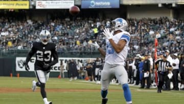 Aug 15, 2014; Oakland, CA, USA; Detroit Lions wide receiver Golden Tate (15) prepares to catch a touchdown pass against the Oakland Raiders in the first quarter at O.co Coliseum. Mandatory Credit: Cary Edmondson-USA TODAY Sports