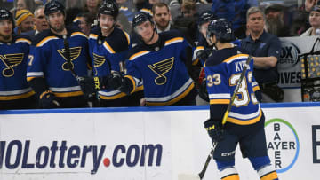 ST. LOUIS, MO. - DECEMBER 09: St. Louis Blues center Jordan Kyrou (33) is congratulated by teammates after scoring his first NHL goal during a NHL game between the Vancouver Canucks and the St. Louis Blues on December 09, 2018, at Enterprise Center, St. Louis, MO. (Photo by Keith Gillett/Icon Sportswire via Getty Images)