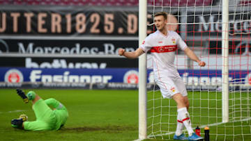 STUTTGART, GERMANY - MARCH 14: Sasa Kalajdzic of VfB Stuttgart celebrates after their side's first goal, an own goal scored by Kasim Adams (Not pictured) of TSG 1899 Hoffenheim during the Bundesliga match between VfB Stuttgart and TSG Hoffenheim at Mercedes-Benz Arena on March 14, 2021 in Stuttgart, Germany. Sporting stadiums around Germany remain under strict restrictions due to the Coronavirus Pandemic as Government social distancing laws prohibit fans inside venues resulting in games being played behind closed doors. (Photo by Matthias Hangst/Getty Images)