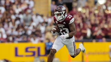 Auburn footballSep 17, 2022; Baton Rouge, Louisiana, USA; Mississippi State Bulldogs running back Dillon Johnson (23) rushes against the LSU Tigers during the first half at Tiger Stadium. Mandatory Credit: Stephen Lew-USA TODAY Sports