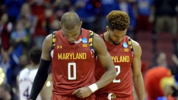 Mar 24, 2016; Louisville, KY, USA; Maryland Terrapins guard Rasheed Sulaimon (0) and guard Melo Trimble (2) reacts after the game the Kansas Jayhawks in a semifinal game in the South regional of the NCAA Tournament at KFC YUM!. Mandatory Credit: Jamie Rhodes-USA TODAY Sports