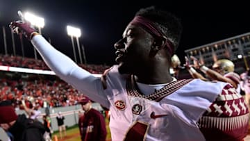 RALEIGH, NC - NOVEMBER 05: Defensive back Tarvarus McFadden #4 of the Florida State Seminoles waves to the crowd following the Florida State Seminoles' victory over the North Carolina State Wolfpack at Carter-Finley Stadium on November 5, 2016 in Raleigh, North Carolina. (Photo by Mike Comer/Getty Images)