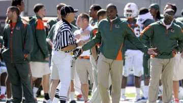 MIAMI, FL - NOVEMBER 06: Head coach Randy Shannon of the Miami Hurricanes talks with an official during the game against the Maryland Terrapins at Sun Life Stadium on November 6, 2010 in Miami, Florida. Miami defeated Maryland 26-20. (Photo by G Fiume/Maryland Terrapins/Getty Images)