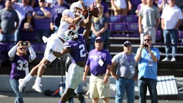 Oct 22, 2016; Manhattan, KS, USA; Kansas State Wildcats defensive back DJ Reed (2) breaks up a pass intended for Texas Longhorns cornerback Davante Davis (9) during a game at Bill Snyder Family Football Stadium. The Wildcats won, 24-21. Mandatory Credit: Scott Sewell-USA TODAY Sports
