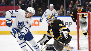 Nov 6, 2021; Toronto, Ontario, CAN; Toronto Maple Leafs forward Auston Matthews (34) moves in to score a goal on Boston Bruins goalie Linus Ullmark (35) in the second period at Scotiabank Arena. Mandatory Credit: Dan Hamilton-USA TODAY Sports