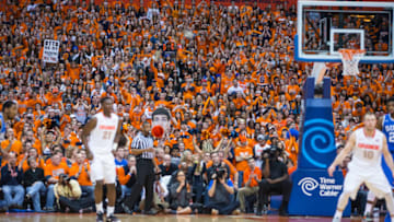 SYRACUSE, NY - FEBRUARY 14: Syracuse Orange student fans give a deafening cheer during the first half of the game between the Syracuse Orange and the Duke Blue Devils on February 14, 2015 at The Carrier Dome in Syracuse, New York. Duke defeats Syracuse 80-72. (Photo by Brett Carlsen/Getty Images)