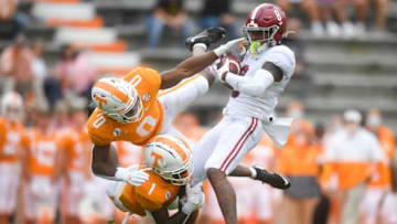 Oct 24, 2020; Knoxville, Tennessee, USA; Tennessee defensive back Bryce Thompson (0) and Tennessee defensive back Trevon Flowers (1) tackle Alabama wide receiver John Metchie III (8) during a game between Alabama and Tennessee at Neyland Stadium in Knoxville, Tenn. on Saturday, Oct. 24, 2020. Mandatory Credit: Caitie McMekin-USA TODAY NETWORK