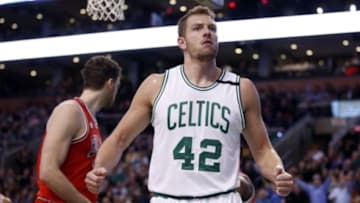 Dec 9, 2015; Boston, MA, USA; Boston Celtics forward David Lee (42) reacts to the crowd after his basket against the Chicago Bulls in the second half at TD Garden. Celtics defeated the Bulls 105-100. Mandatory Credit: David Butler II-USA TODAY Sports