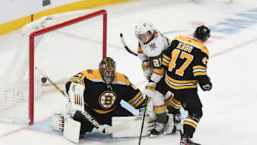 BOSTON, MA - JANUARY 21: Jaroslav Halak #41 of the Boston Bruins deflects the puck against the Vegas Golden Knights the TD Garden on January 21, 2020 in Boston, Massachusetts. (Photo by Steve Babineau/NHLI via Getty Images)