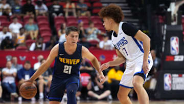 Denver Nuggets guard Collin Gillespie (21) dribbles against LA Clippers guard Jason Preston (17) during an NBA Summer League game at Thomas & Mack Center on 13 Jul. 2022. (Stephen R. Sylvanie-USA TODAY Sports)