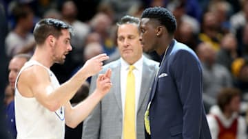 INDIANAPOLIS, INDIANA - DECEMBER 15: T.J. McConnell #9 of the Indiana Pacers talks with Victor Oladipo #4 during a timeout in the game against the Charlotte Hornets at Bankers Life Fieldhouse on December 15, 2019 in Indianapolis, Indiana. NOTE TO USER: User expressly acknowledges and agrees that, by downloading and or using this photograph, User is consenting to the terms and conditions of the Getty Images License Agreement. (Photo by Justin Casterline/Getty Images) (Photo by Justin Casterline/Getty Images)