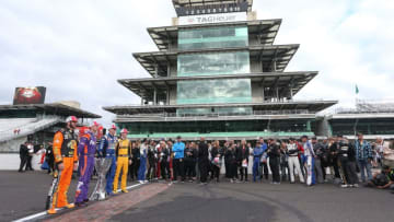 INDIANAPOLIS, IN - SEPTEMBER 10: Martin Truex Jr., driver of the #78 Auto-Owners Insurance Toyota, Denny Hamlin, driver of the #11 FedEx Possibilities Toyota, Kyle Busch, driver of the #18 M&M's Caramel Toyota, Erik Jones, driver of the #20 buyatoyota.com Toyota, pose for a photo with the Monster Energy NASCAR Cup Series trophy after making the playoffs following the Monster Energy NASCAR Cup Series Big Machine Vodka 400 at the Brickyard at Indianapolis Motor Speedway on September 10, 2018 in Indianapolis, Indiana. (Photo by Matt Sullivan/Getty Images)