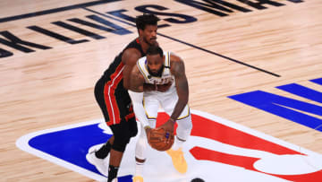 Jimmy Butler #22 of the Miami Heat defends LeBron James #23 of the Los Angeles Lakers(Photo by Mike Ehrmann/Getty Images)