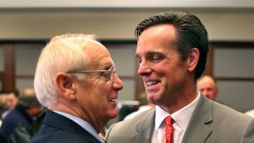 BOSTON - MARCH 26: David Quinn was introduced as the new head hockey coach at Boston University during a press conference. After the press conference he went over to former coach Jack Parker and hugged him. Quinn replaced Parker, who retired. (Photo by John Tlumacki/The Boston Globe via Getty Images)