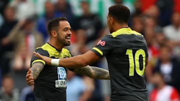 ROTTERDAM, NETHERLANDS - JULY 28: Che Adams (R) of Southampton celebrates scoring his teams first goal of the game with Danny Ings during the pre season friendly match between Feyenoord Rotterdam and Southampton Football Club at Stadion Feijenoord or De Kuip on July 28, 2019 in Rotterdam, Netherlands. (Photo by Dean Mouhtaropoulos/Getty Images)