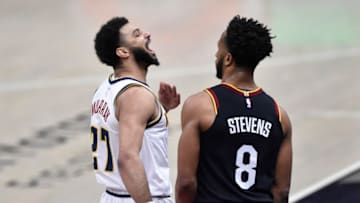 Feb 19, 2021; Cleveland, Ohio, USA; Denver Nuggets guard Jamal Murray (27) reacts after making a three-point basket in the fourth quarter against the Cleveland Cavaliers at Rocket Mortgage FieldHouse. Mandatory Credit: David Richard-USA TODAY Sports