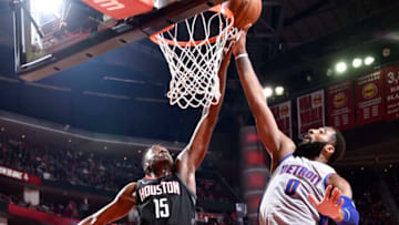HOUSTON, TX - MARCH 22: Clint Capela #15 of the Houston Rockets and Andre Drummond #0 of the Detroit Pistons reach for the rebound during the game between the two teams on March 22, 2018 at the Toyota Center in Houston, Texas. NOTE TO USER: User expressly acknowledges and agrees that, by downloading and or using this photograph, User is consenting to the terms and conditions of the Getty Images License Agreement. Mandatory Copyright Notice: Copyright 2018 NBAE (Photo by Bill Baptist/NBAE via Getty Images)
