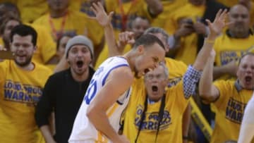 Apr 27, 2014; Oakland, CA, USA; Golden State Warriors guard Stephen Curry (30) celebrates after blocking the shot of Los Angeles Clippers guard J.J. Redick (4, not pictured) during the fourth quarter in game four of the first round of the 2014 NBA Playoffs at Oracle Arena. The Warriors defeated the Clippers 118-97. Mandatory Credit: Kyle Terada-USA TODAY Sports
