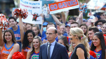 Fans cheer for Paul Finebaum and Laura Rutledge during the filming of the "SEC Nation" college football show, at the Plaza of the Americas on the University of Florida campus, in Gainesville, Florida, on Sept. 18, 2021.Flgai 091821 Secnationufvbama 25