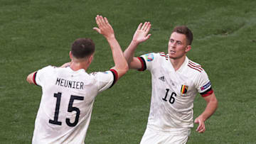 Thorgan Hazard (R) celebrates with Thomas Meunier after scoring (Photo by HANNAH MCKAY/POOL/AFP via Getty Images)