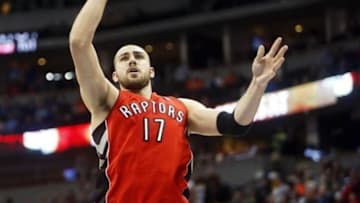 Jan 31, 2014; Denver, CO, USA; Toronto Raptors center Jonas Valanciunas (17) shoots the ball during the second half against the Denver Nuggets at Pepsi Center. The Raptors won 100-90. Mandatory Credit: Chris Humphreys-USA TODAY Sports