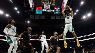 Jayson Tatum #0 of the Boston Celtics shoots over Kyle Lowry #7 of the Miami Heat (Photo By Winslow Townson/Getty Images)
