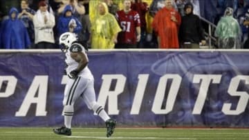 Sep 12, 2013; Foxboro, MA, USA; New York Jets guard Willie Colon (66) leaves the field after being ejected from game against the New England Patriots at Gillette Stadium. Mandatory Credit: William Perlman/THE STAR-LEDGER via USA TODAY Sports