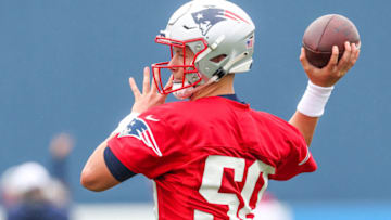 Jul 28, 2021; Foxborough, MA, United States; New England Patriots quarterback Mac Jones (50) during training camp at Gillette Stadium. Mandatory Credit: Paul Rutherford-USA TODAY Sports
