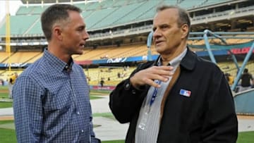 Apr 5, 2013; Los Angeles, CA, USA; MLB executive vice president of baseball operations Joe Torre talks with MLB umpire Dan Iassogna before the game against the Pittsburgh Pirates at Dodger Stadium. Mandatory Credit: Jayne Kamin-Oncea-USA TODAY Sports