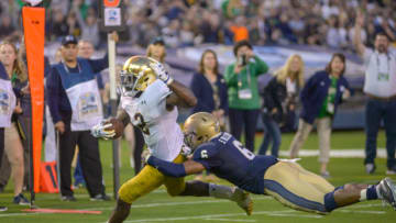 SAN DIEGO, CA - OCTOBER 27: Dexter Williams #2 of the Notre Dame Fighting Irish runs with the ball in the 1st half against Sean Wiiliams #6 of the Navy Midshipmen at SDCCU Stadium on October 27, 2018 in San Diego, California. (Photo by Kent Horner/Getty Images)