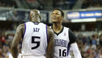Apr 16, 2014; Sacramento, CA, USA; Sacramento Kings forward Quincy Acy (5) celebrates with guard Ben McLemore (16) after his basket and foul against the Phoenix Suns during the fourth quarter at Sleep Train Arena. The Phoenix Suns defeated the Sacramento Kings 104-99. Mandatory Credit: Kelley L Cox-USA TODAY Sports
