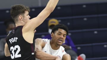Auburn basketballMar 6, 2021; Auburn, Alabama, USA; Auburn Tigers center Dylan Cardwell (44) passes the ball around Mississippi State Bulldogs forward Quinten Post (32) during the second half between the Auburn Tigers and the Mississippi State Bulldogs at Auburn Arena. Mandatory Credit: Julie Bennett-USA TODAY Sports