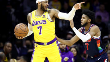 PHILADELPHIA, PENNSYLVANIA - JANUARY 27: Carmelo Anthony #7 of the Los Angeles Lakers controls the ball against Isaiah Joe #7 of the Philadelphia 76ers during the second quarter at Wells Fargo Center on January 27, 2022 in Philadelphia, Pennsylvania. NOTE TO USER: User expressly acknowledges and agrees that, by downloading and or using this photograph, User is consenting to the terms and conditions of the Getty Images License Agreement. (Photo by Tim Nwachukwu/Getty Images)