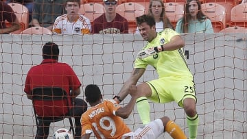 Jun 29, 2016; Houston, TX, USA; Houston Dynamo forward Mauro Manotas (19) shoots and scores on Sporting Kansas City in the second half at BBVA Compass Stadium. Dynamo won 3 to 1. Mandatory Credit: Thomas B. Shea-USA TODAY Sports