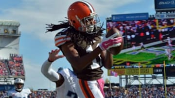 Oct 5, 2014; Nashville, TN, USA; Cleveland Browns wide receiver Travis Benjamin (11) catches the winning touchdown pass against Tennessee Titans safety Bernard Pollard (31) during the second half at LP Field. The Browns beat the Titans 29-28. Mandatory Credit: Don McPeak-USA TODAY Sports