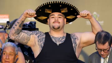 RIYADH, SAUDI ARABIA - DECEMBER 06: Andy Ruiz Jr poses for photos as he weighs in ahead of the IBF, WBA, WBO & IBO World Heavyweight Title Fight between Andy Ruiz Jr and Anthony Joshua during the Clash on the Dunes Weigh In at the the Al Faisaliah Hotel on December 06, 2019 in Riyadh, Saudi Arabia. (Photo by Richard Heathcote/Getty Images)