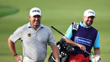 DUBAI, UNITED ARAB EMIRATES - JANUARY 24: Lee Westwood of England and his caddy walk to the seventeenth green during Day Two of the Omega Dubai Desert Classic at Emirates Golf Club on January 24, 2020 in Dubai, United Arab Emirates. (Photo by Ross Kinnaird/Getty Images)