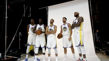 OAKLAND, CA - SEPTEMBER 24: (L-R) Kevin Durant #35, Draymond Green #23, Stephen Curry #30, Klay Thompson #11, and DeMarcus Cousins #0 of the Golden State Warriors pose for a group picture during the Golden State Warriors media day on September 24, 2018 in Oakland, California. (Photo by Ezra Shaw/Getty Images)